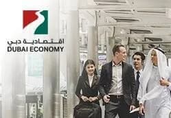 Dubai Economy signage above visitors in a customer service hall